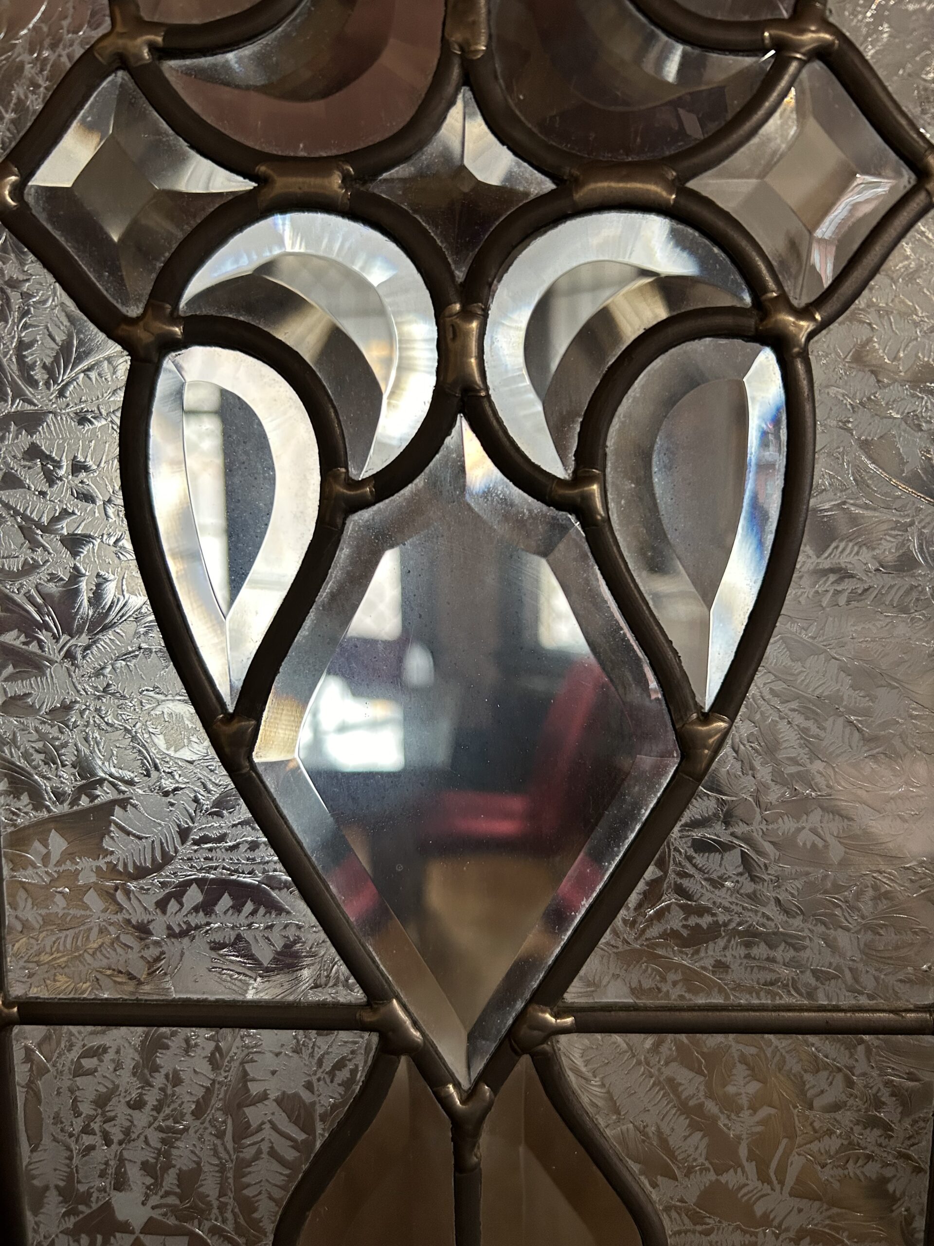 Heart shaped stained glass window at 190 Bronson